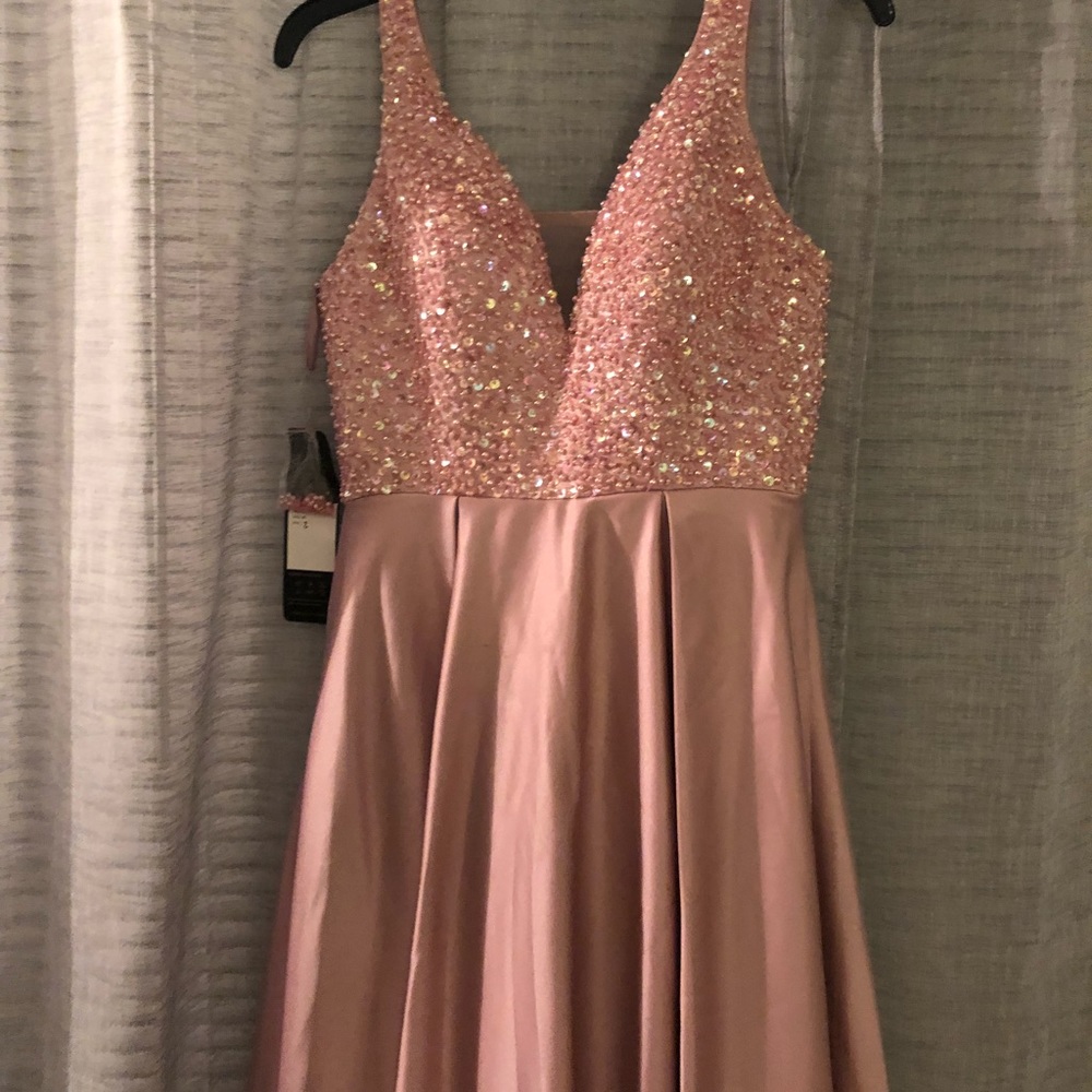 blush pink prom dress, with tags still attached.
